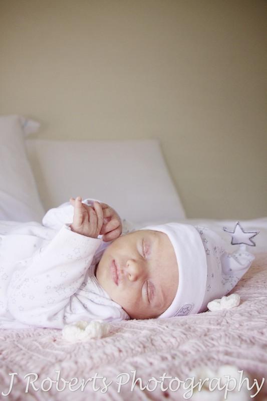 Peaceful baby sleeping on handmade rug - baby portrait photography sydney
